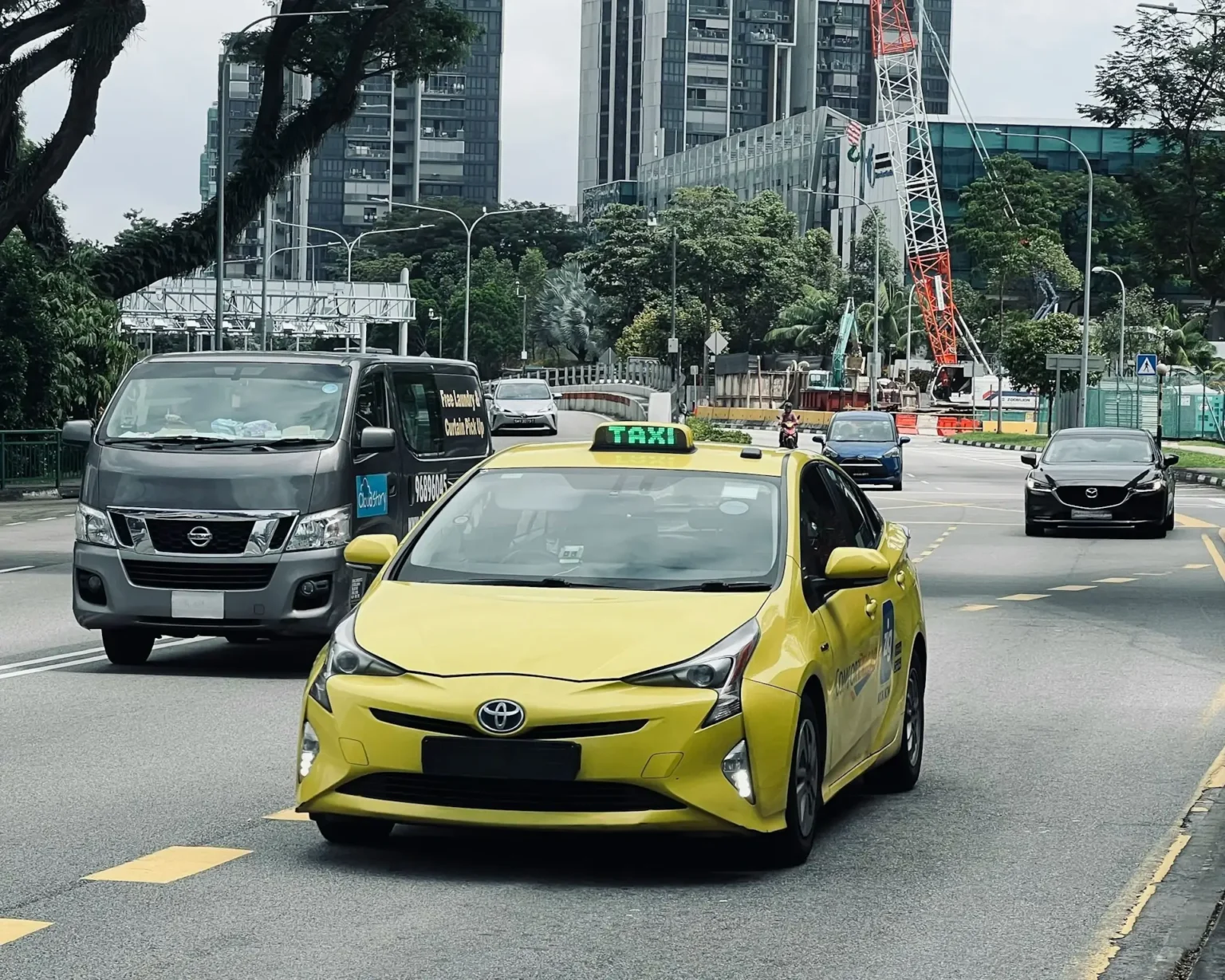 Image of Singapore Taxi heading towards Marina Bay Sands Expo